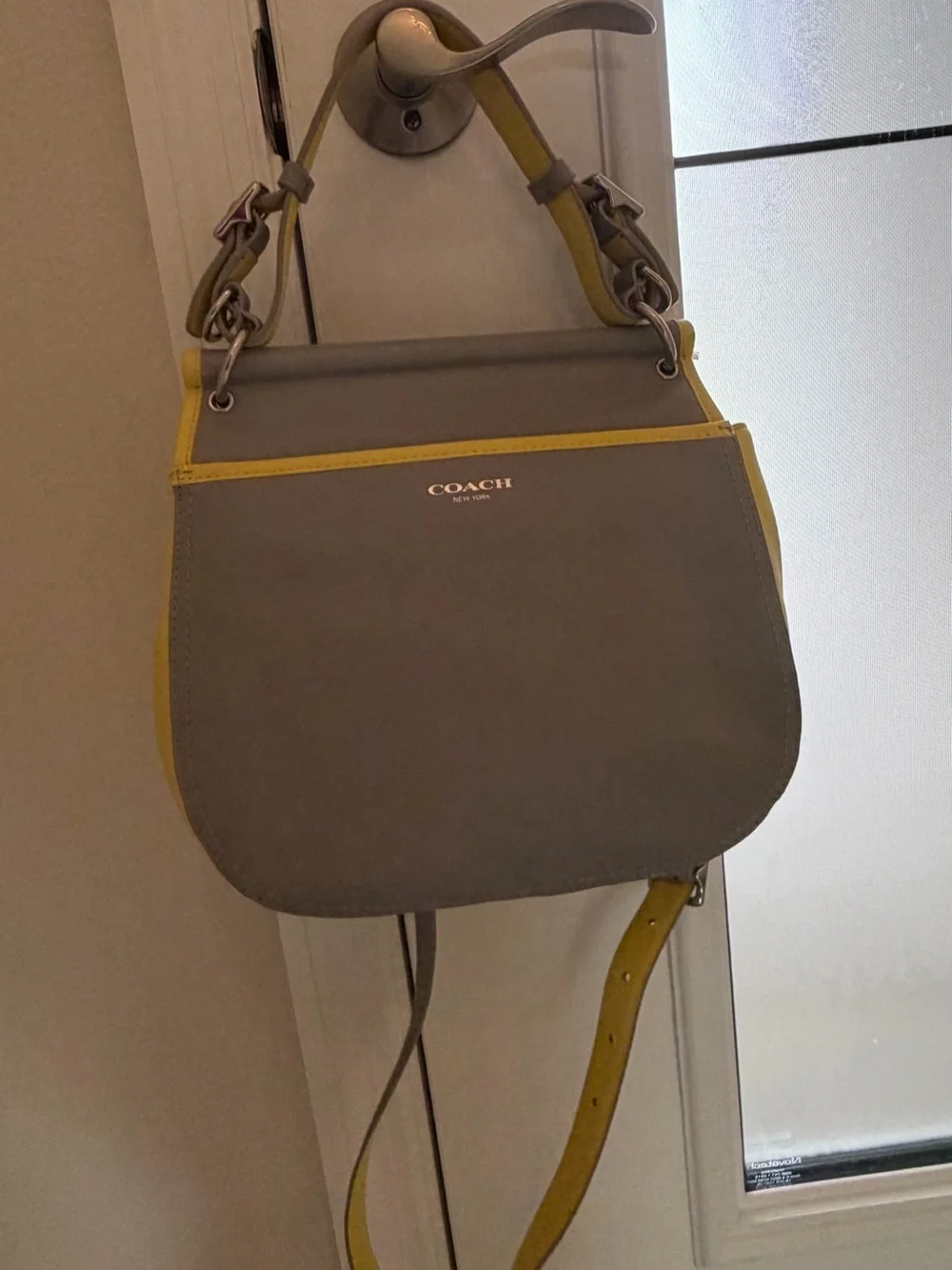 Coach Brand new Gray and Yellow Leather Crossbody Bag with Tassel